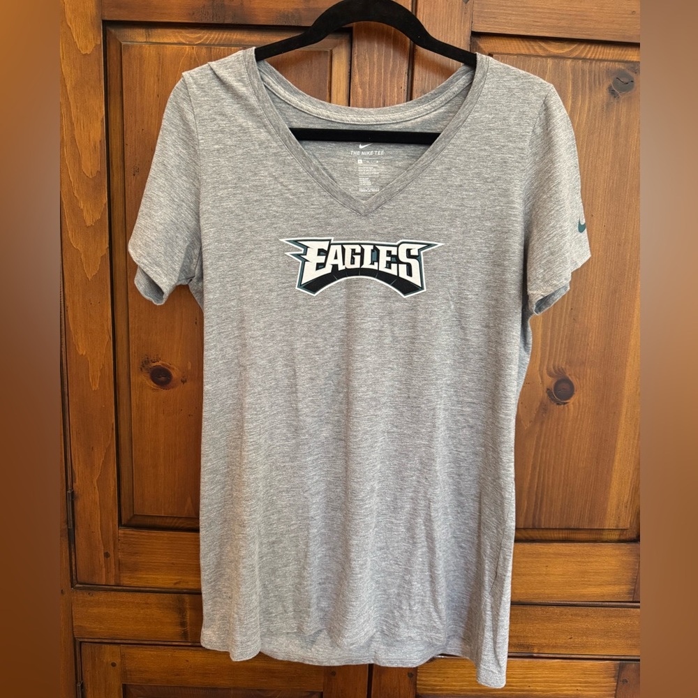 Nike ladies gray EAGLES V-neck tee shirt. Size large. NWOT.
